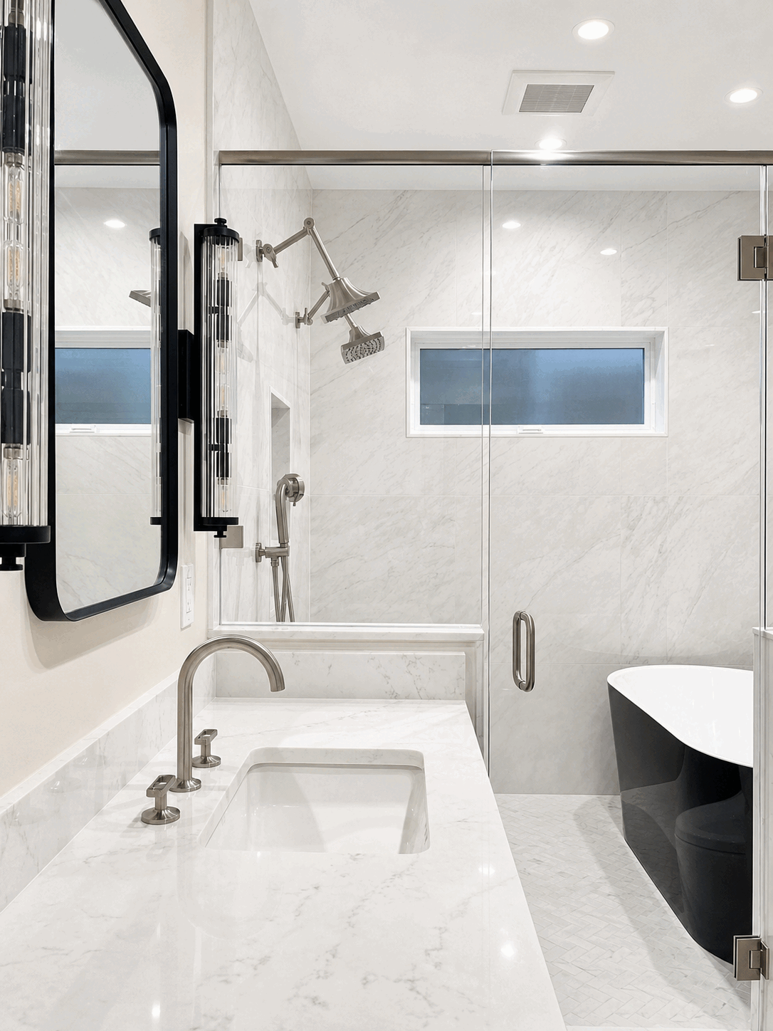 Bright marble bathroom with polished glass and stone surfaces