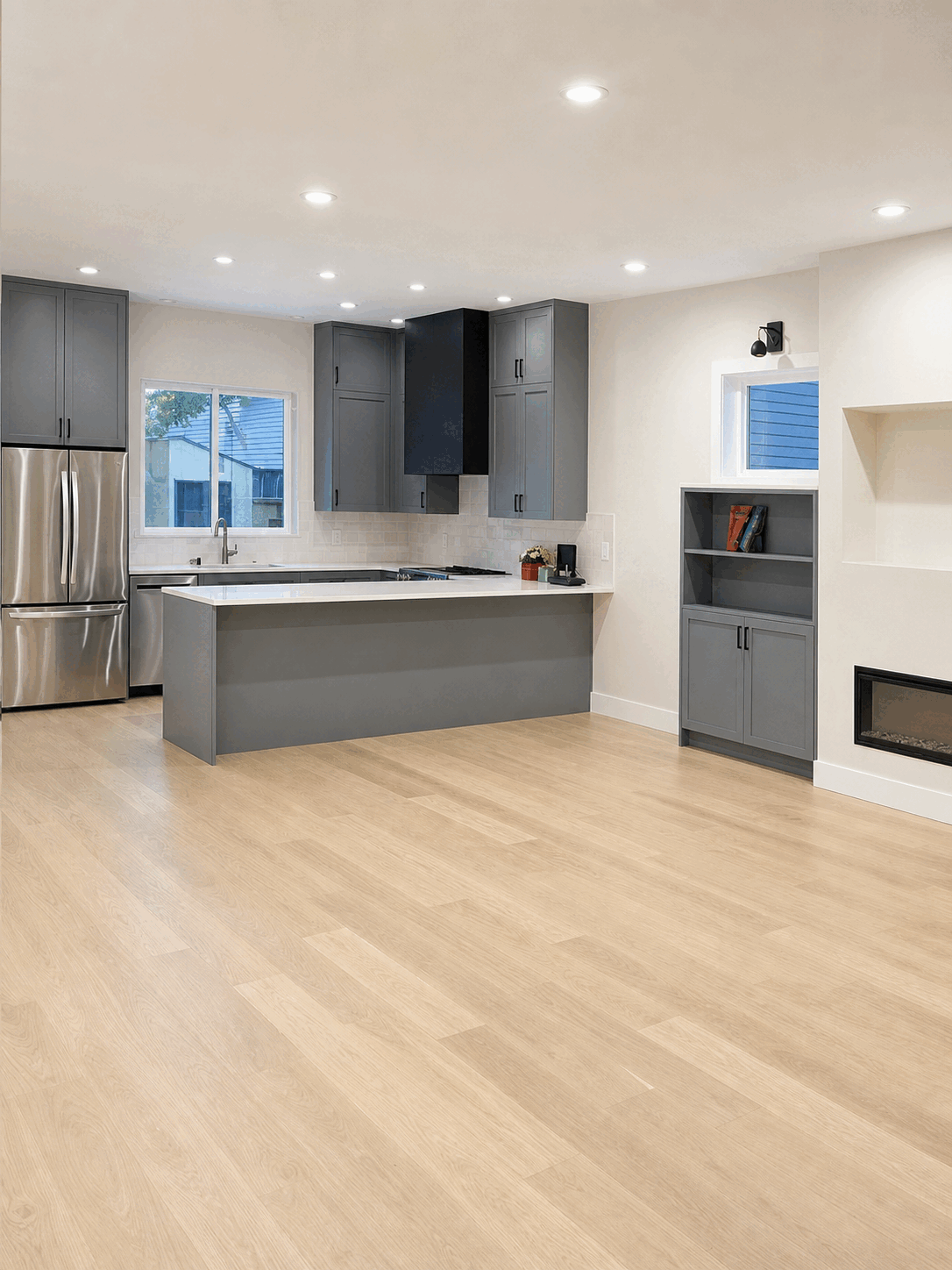 Freshly cleaned empty kitchen and polished wood floor